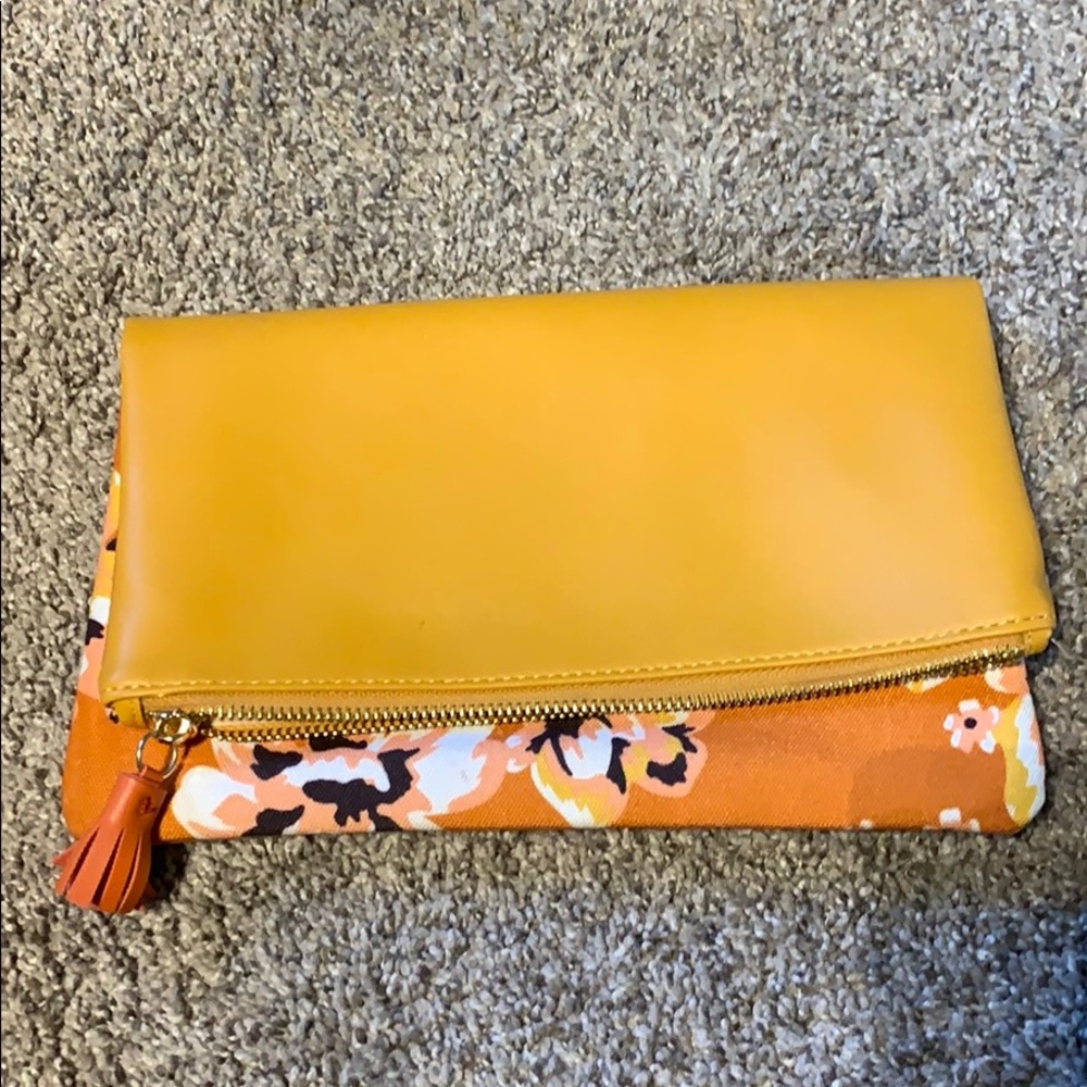 Mustard fold over clutch